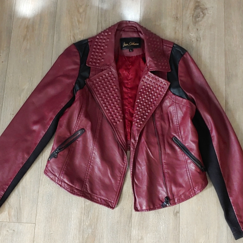 Womans waist length leather-like jacket